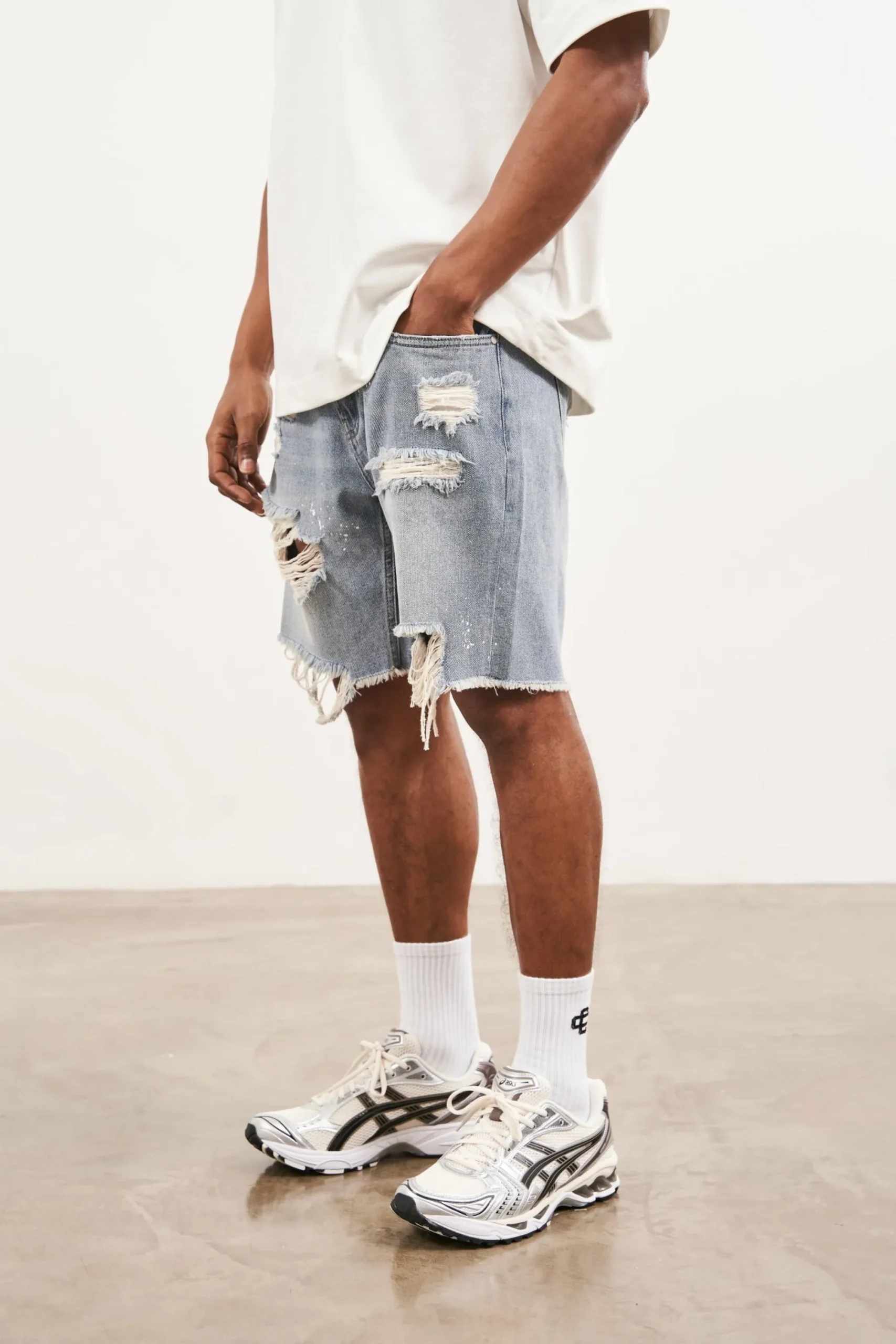 distressed_raw_hem_denim__2-1.webp The Couture Club Shorts-Distressed Raw Hem Denim Shorts