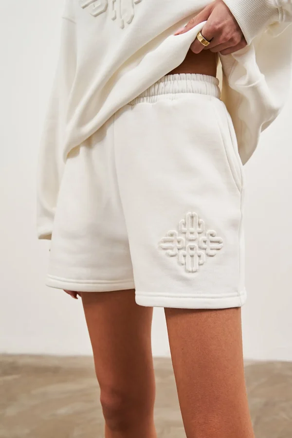 The Couture Club Shorts-Emblem Embossed Shorts
