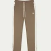 The Couture Club Bottoms-Emblem Side Panel Split Hem Joggers