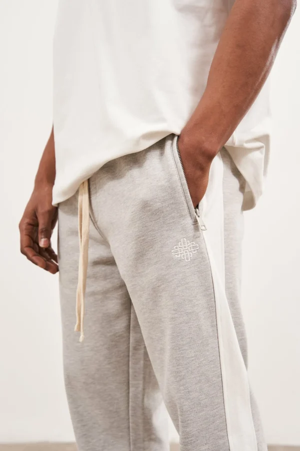 The Couture Club Bottoms-Emblem Side Panel Split Hem Joggers