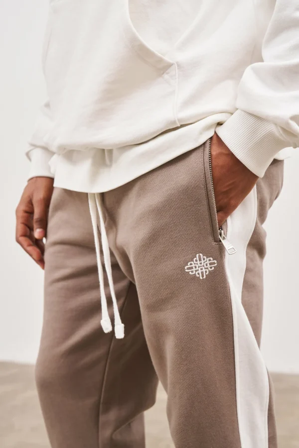 The Couture Club Bottoms-Emblem Side Panel Split Hem Joggers