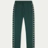 The Couture Club Tracksuits-Emblem Track Joggers
