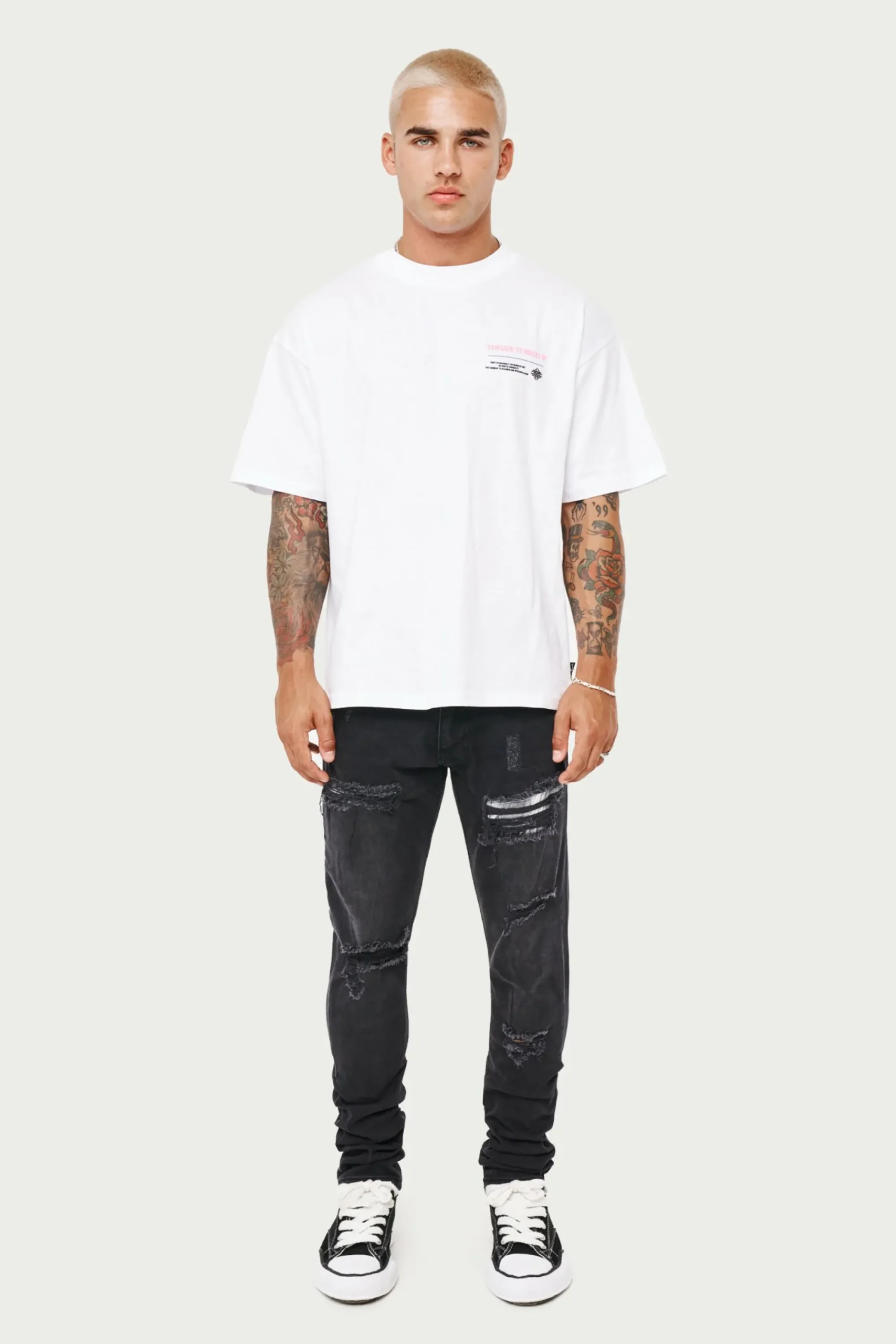 rip_and_repair_stacked_je_2.webp The Couture Club Bottoms-Rip And Repair Stacked Jeans