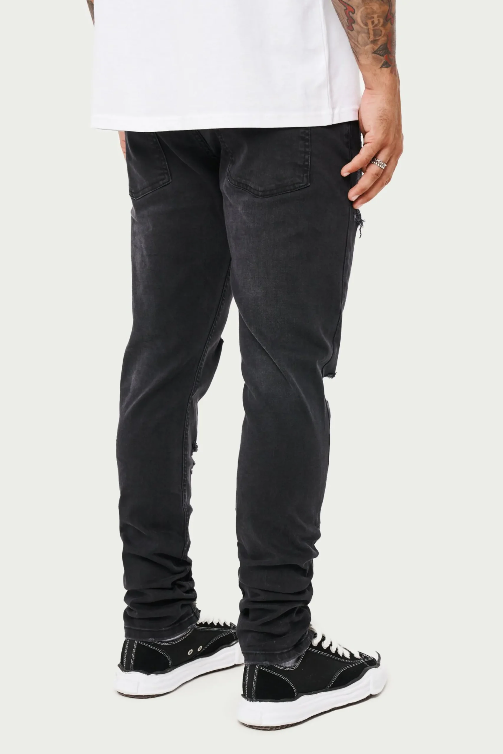 rip_and_repair_stacked_je_4.webp The Couture Club Bottoms-Rip And Repair Stacked Jeans