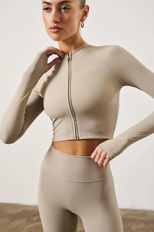 The Couture Club Tops-Sculpting Emblem Zip Through Top