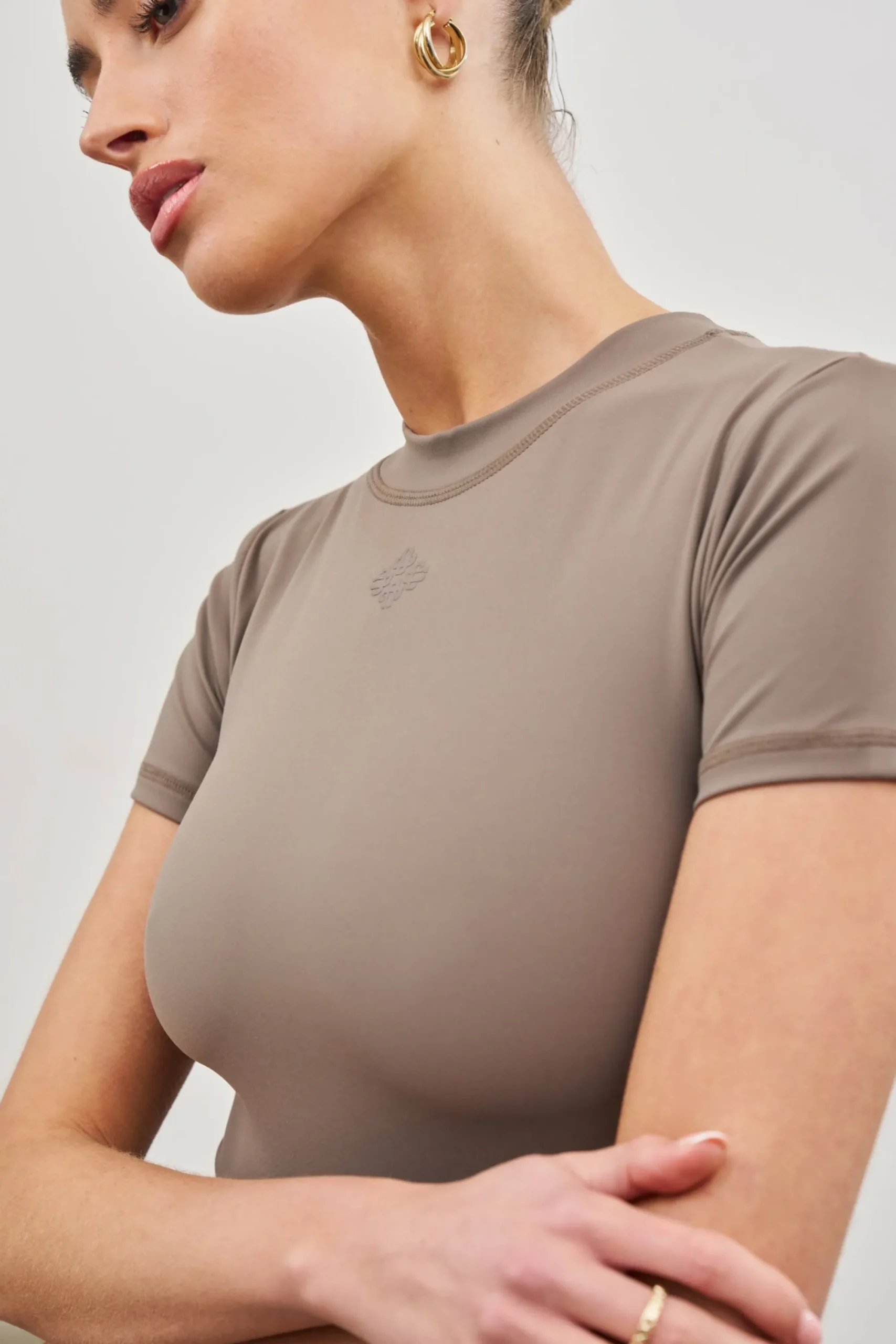 sculpting_stretch_emblem__3-3.webp The Couture Club Tops-Sculpting Stretch Emblem Baby Tee
